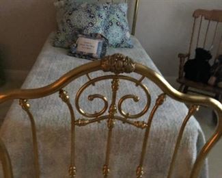 Antique twin size brass bed, anti-tarnish glaze on the brass.