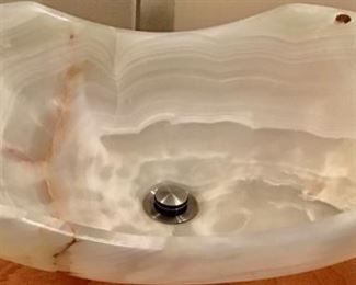 Had to share  ..This  is an   Onyx  Shell Basin in the bathroom .. How darling is this !                                             stays with house