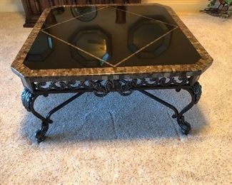 Metal and glass coffee table $230