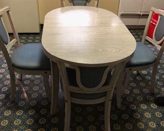 nice mid century modern table and 4 chairs