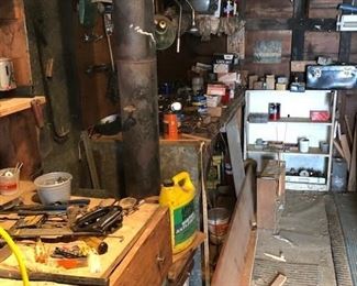 three garages full of tools and stuff
