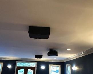 Projection television with ceiling speakers