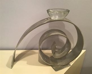 Brushed metal candle holder