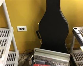 Guitar shaped gun case