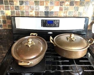 Copper roasting pans. We have a cabinet full of cookware. Including Calphalon 