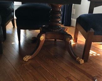 Pedestal view of sofa. Brass tips on claw feet