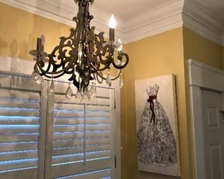 chrome chandelier in master bathroom