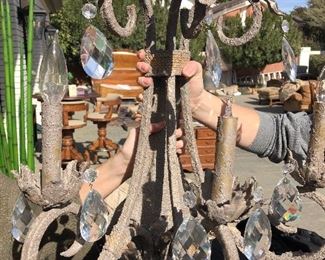 Pair of iron & crystal sconces