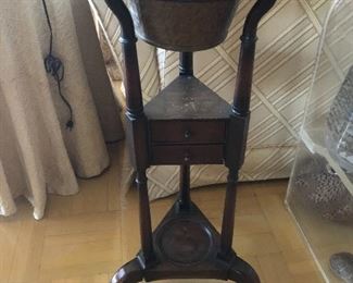 Tri-leg antique plant stand. Approx. 33" tall.