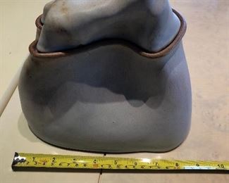 Clay, lidded pot, viscous design. Approx. 8" wide and 8" tall.