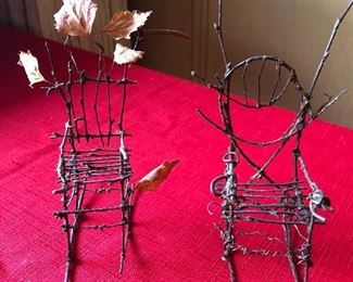 Two tiny chairs made from twigs. Approx. 6" tall.
