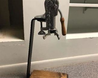 Pewter "Estate", free standing wine opener on wooden stand. 23" Tall
