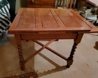 Rope twisted leg draw table