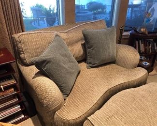 $700.   Custom chair + 1/2 and ottoman.  Robert Allen fabric.  Chair: 35H x 54W x 46D.  Ottoman: 16H x 44W x 30D.  ($4000 when new)  