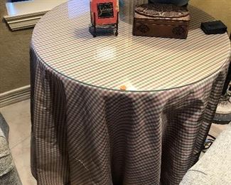 $125   Round skirted table with glass top.  Fabric is Robert Allen silk.   EUC. 28H x 30 diameter.   Pick up by November 12 in Seven Meadows in Katy. 
