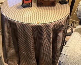 $125   Round skirted table with glass top.  Fabric is Robert Allen silk.   EUC. 28H x 30 diameter.   Pick up by November 12 in Seven Meadows in Katy. 