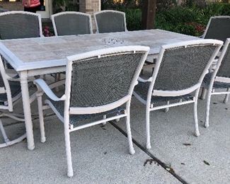 $175.  Outdoor seating set.  The table needs painting and the seats need to be rewoven.  The set is high end designer and in great condition otherwise.