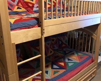 $500.   Twin over twin bunkbed with trundle.  Comes with all 3 mattresses.  Ladder built into the bed for safety.  High quality