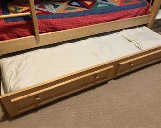 $500.   Twin over twin bunkbed with trundle.  Comes with all 3 mattresses.  Ladder built into the bed for safety.  High quality