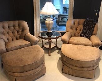 Norwalk leather chairs with ottomans 