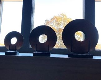 Copper rings on stands 