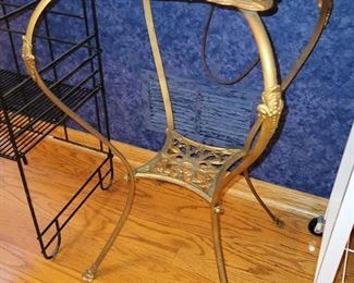 Antique metal painted gold plant stand. (in this case, it is holding a gorgeous lamp whose base fits perfectly!