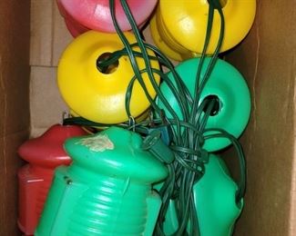 String of large, colorful retro plastic blow mold lantern patio lights