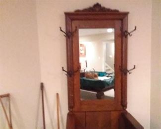 4. $400. Vintage Oak Hall Tree and Seat with Storage and beveled Mirror