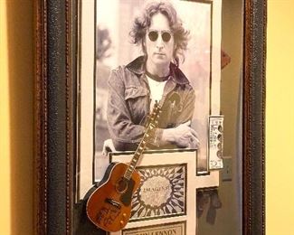John Lennon Collage, including photographs and a 1964 ticket to a Beatles show in Cleveland, Ohio and a signed miniature guitar