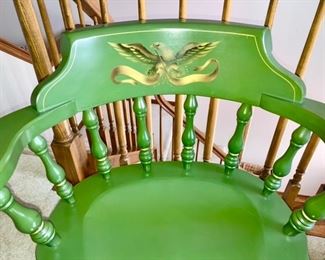Eagle decor on green painted chairs