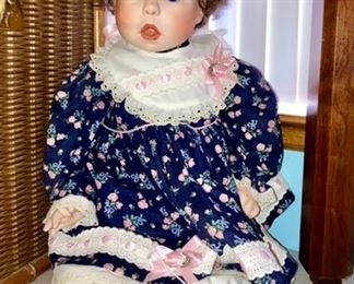 Collectible doll, signed