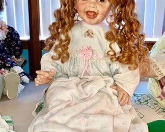Collectible doll, signed