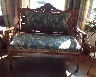 A old settee from the Goodman company in Cleveland. Nicely refinished.