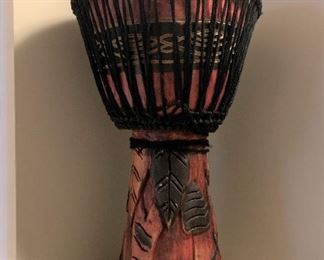 Carved wooden drum. Needs repair. Details and pricing will be available on November 19th after 6 p.m. at https://shop.mlestatesales.com
