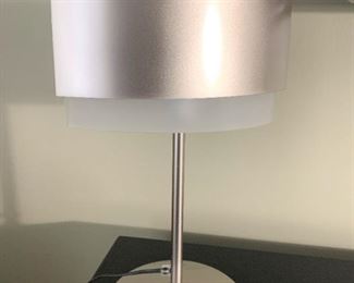 Contemporary metal and frosted glass lamp. Details and pricing will be available on November 19th after 6 p.m. at https://shop.mlestatesales.com