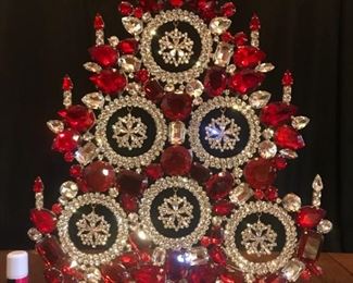 Red and clear crystal with dangly snowflakes.  13" tall. $625