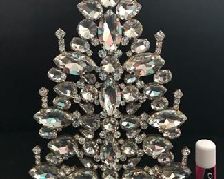All bright clear glass crystals.  8" tall.  $295