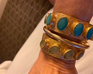 87. Gold plated bangle with stones $60 each 
