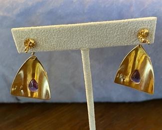 95. 18kt gold earrings and Amethyst $795