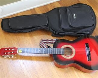 #15. $75.00. Sunlite 6 string acoustic guitar with case