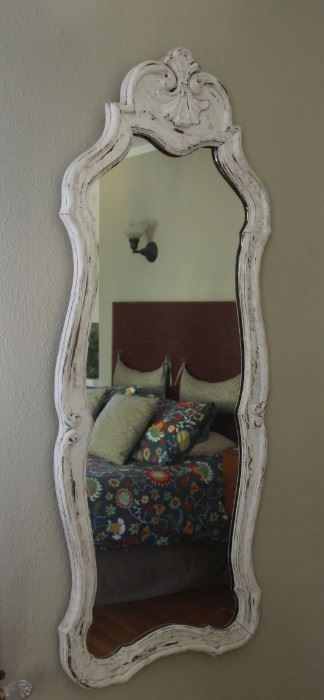#28 . $60.00. White painted framed mirror 50” X 19”