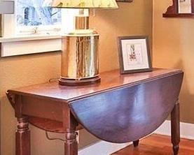 #8. 125.00. Drop leaf table 27.5”h X 49.5”w with leaves up X 42”d with leaves down 19.5
Note: table lamp is not for sale.