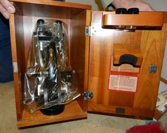 Vintage microscope in wooden case