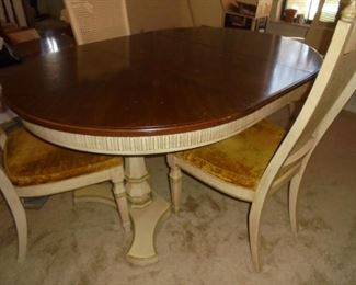 Solid wood dining table w/leaf & 4 matching cane back chairs