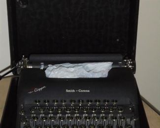 Vintage portable Smith Corona 'Clipper' typewriter in original hard case