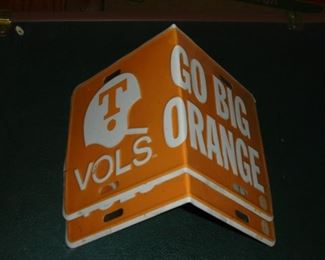 2 'Go Big Orange' licence plates bent for bird houses