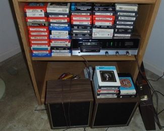 Vintage GE 8 track player w/58 tapes (all tapes notbroken)  and 2 matching speakers