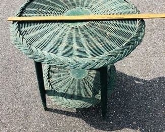 Garden Wicker Table With Shelf.  With the original green paint measures approx. 25 in. tall by 22 in. wide.