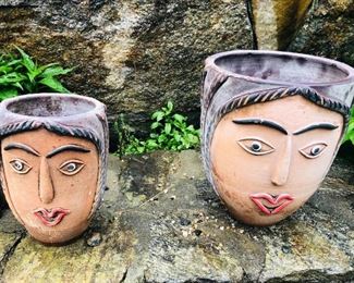 Two Clay Garden Ports with Faces.  They stand approx. 14 in. tall