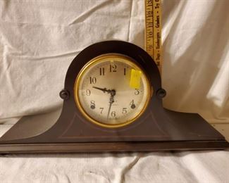 Vintage Seth Thomas mantel clock with the initials of S.T. on the clock hands. It is 20 inches long and about 9.5 inches tall.